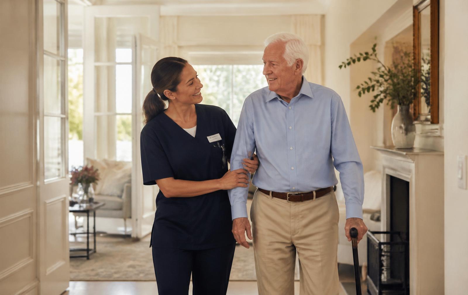 Nurse walking with elderly gentleman at home